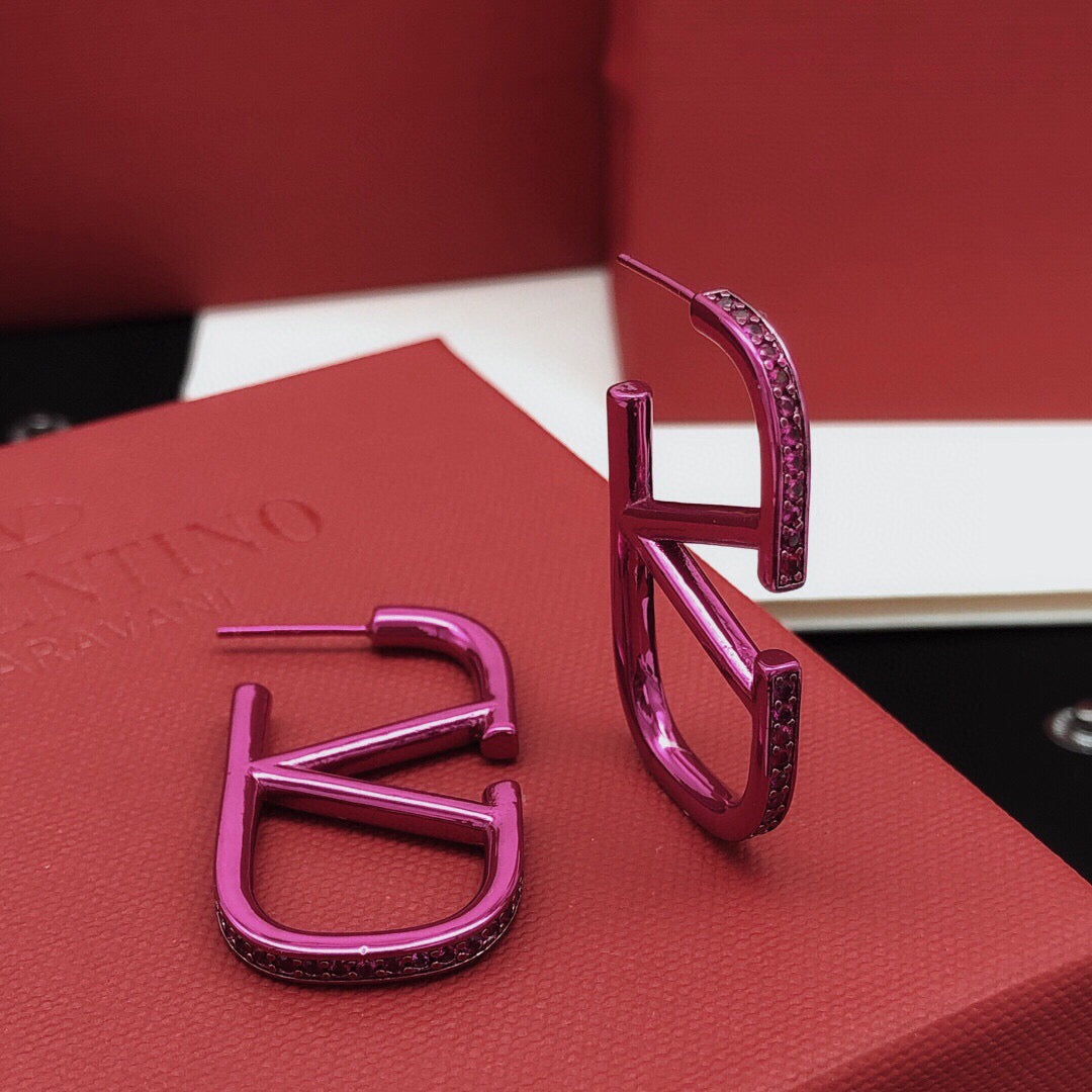 Martin Graham stud earrings in polished metal-tone – main product view