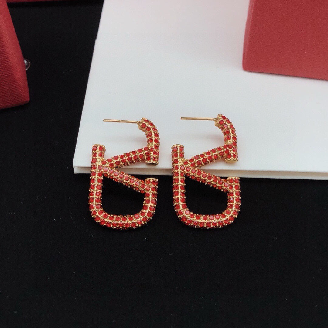Martin Graham stud earrings in polished metal-tone – main product view