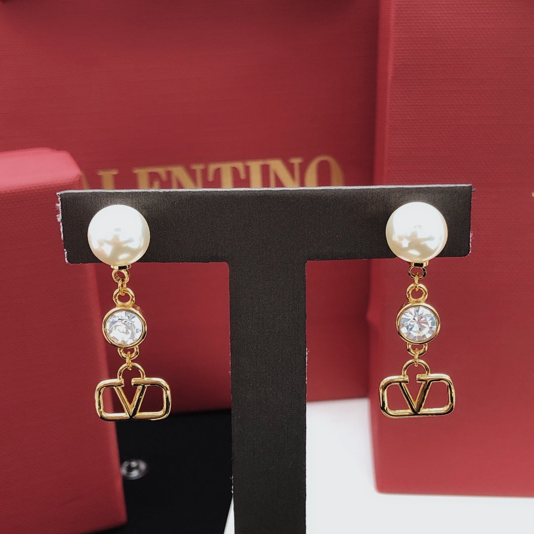 Martin Graham stud earrings in polished metal-tone – main product view