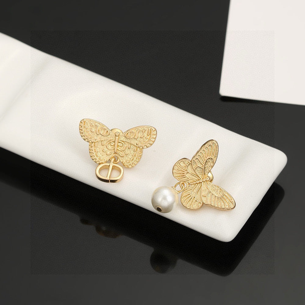 Martin Graham stud earrings in polished metal-tone – main product view