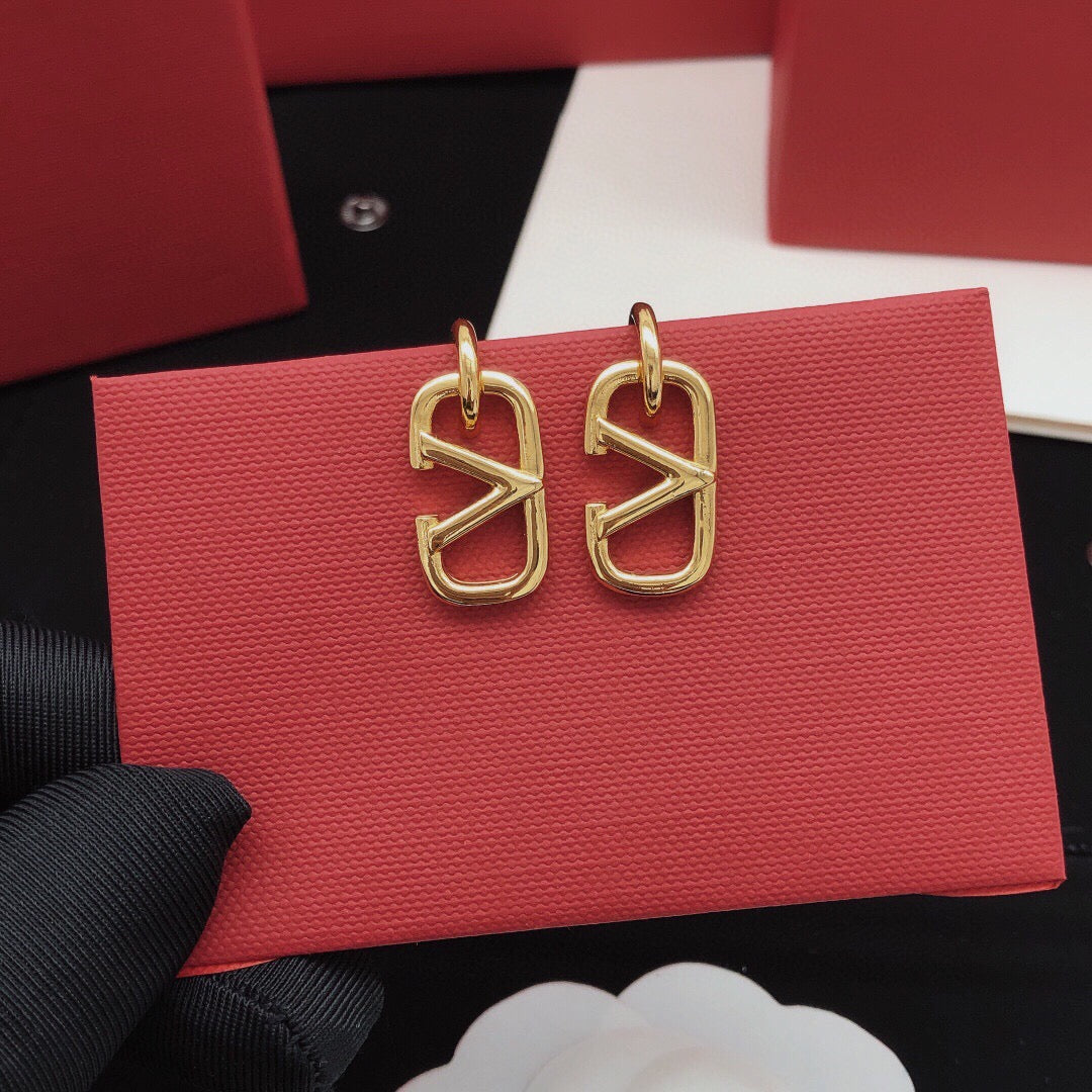 Martin Graham drop earrings in polished metal-tone – main product view
