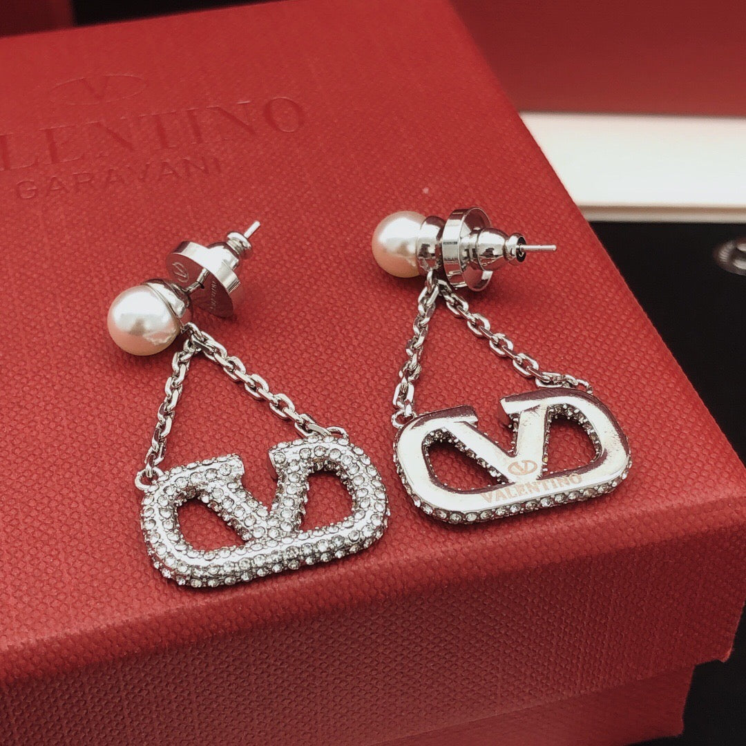 Martin Graham stud earrings in polished metal-tone – main product view