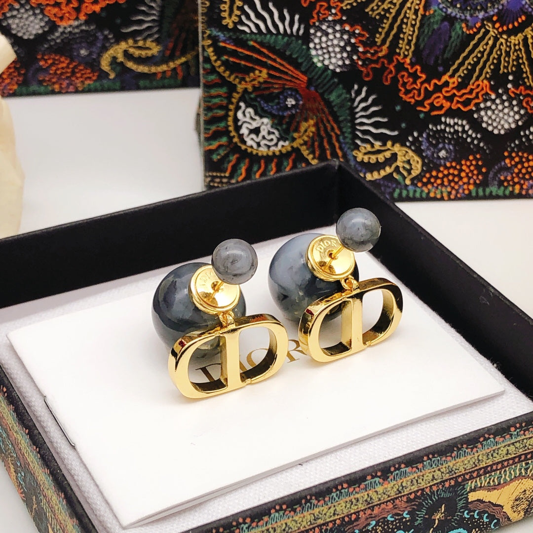 Martin Graham stud earrings in polished metal-tone – main product view