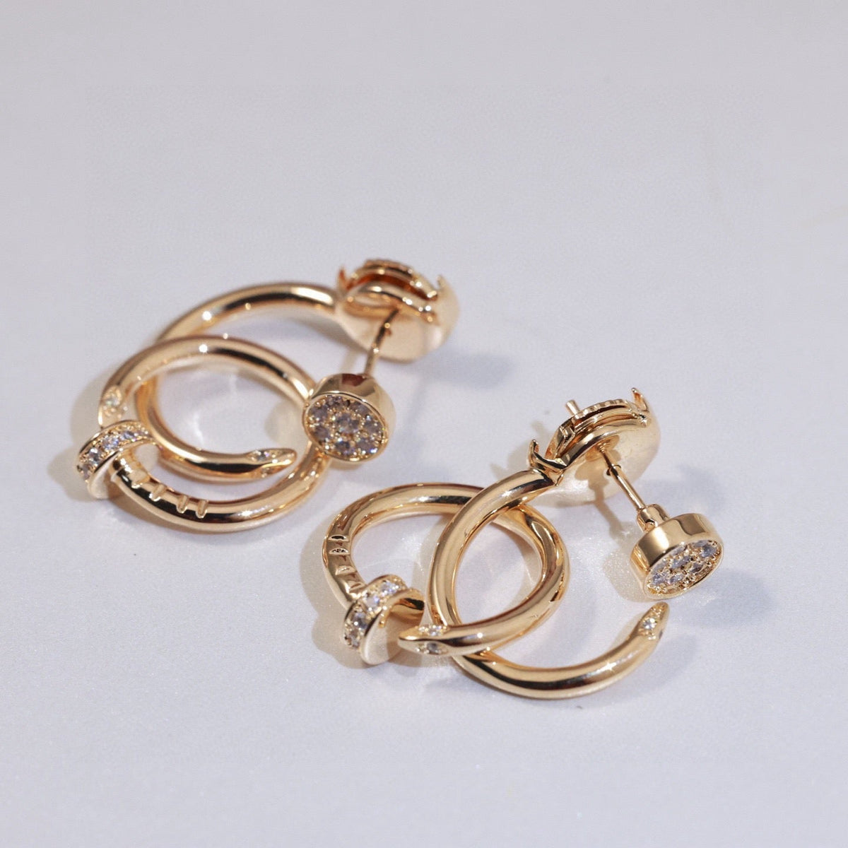 Martin Graham stud earrings in polished metal-tone – main product view