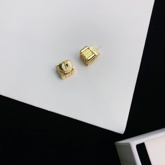 Martin Graham stud earrings in polished metal-tone – main product view