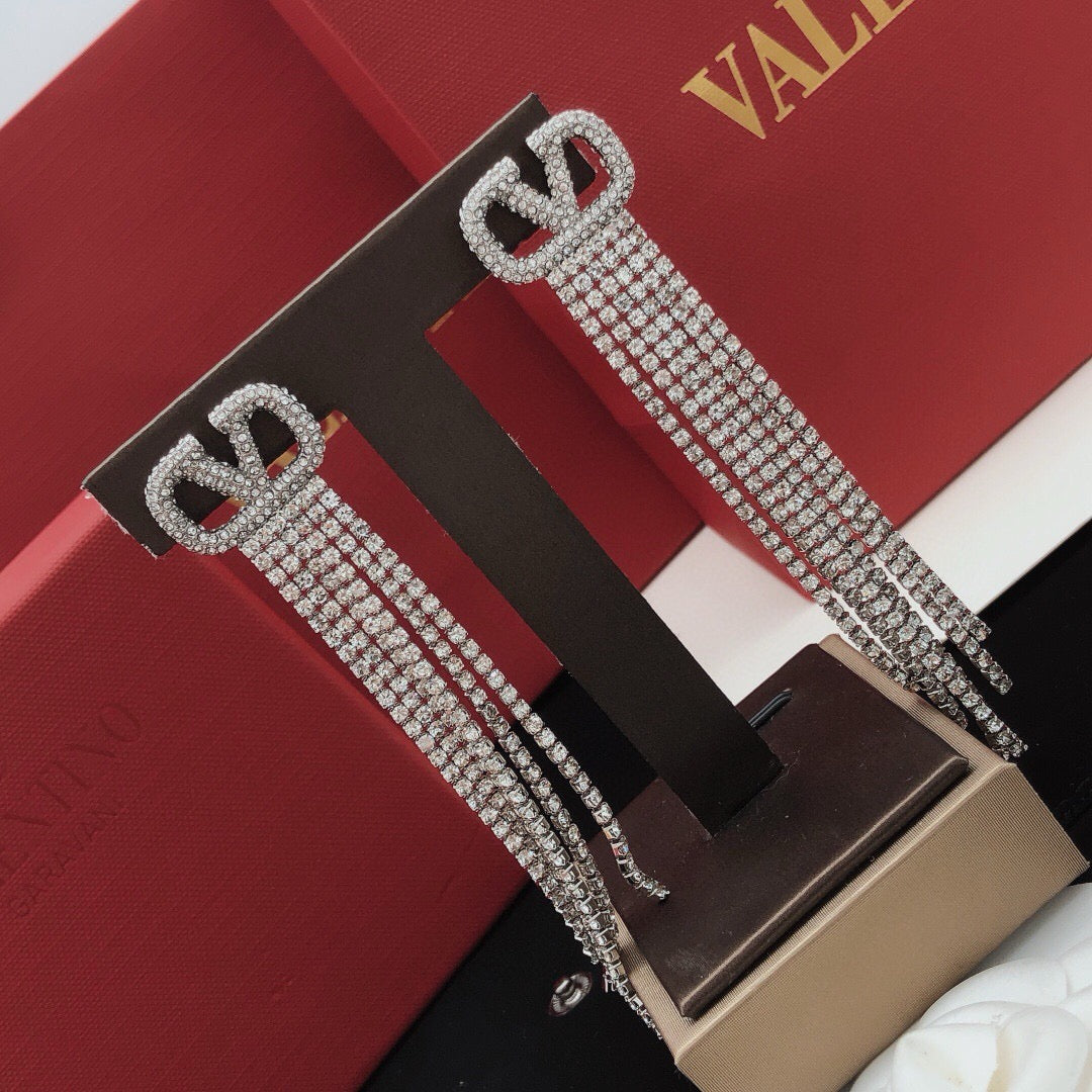 Martin Graham stud earrings in polished metal-tone – main product view