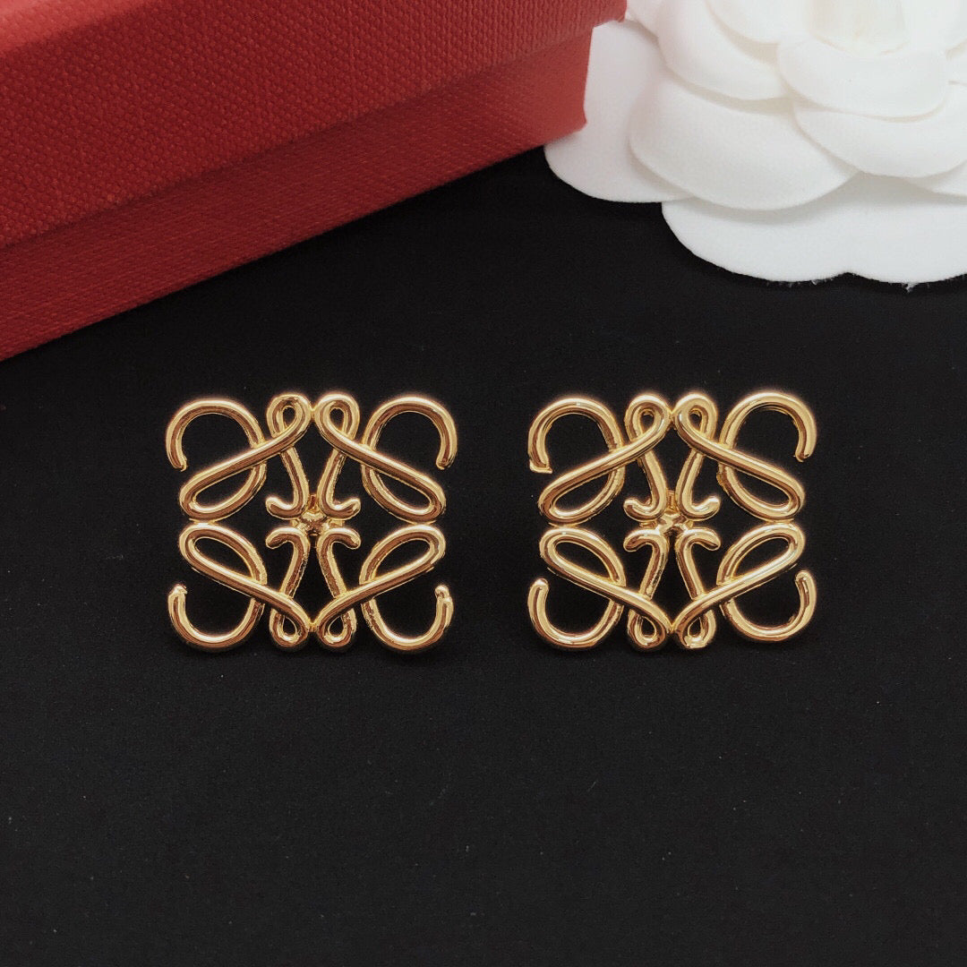 Martin Graham stud earrings in polished metal-tone – main product view