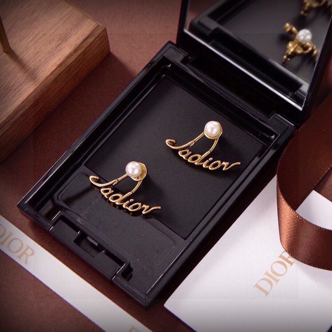 Martin Graham stud earrings in polished metal-tone – main product view