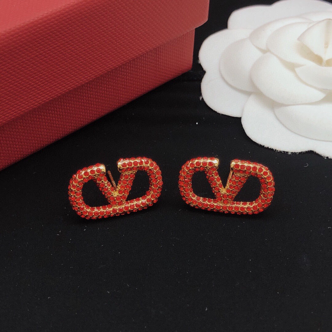 Martin Graham stud earrings in polished metal-tone – main product view