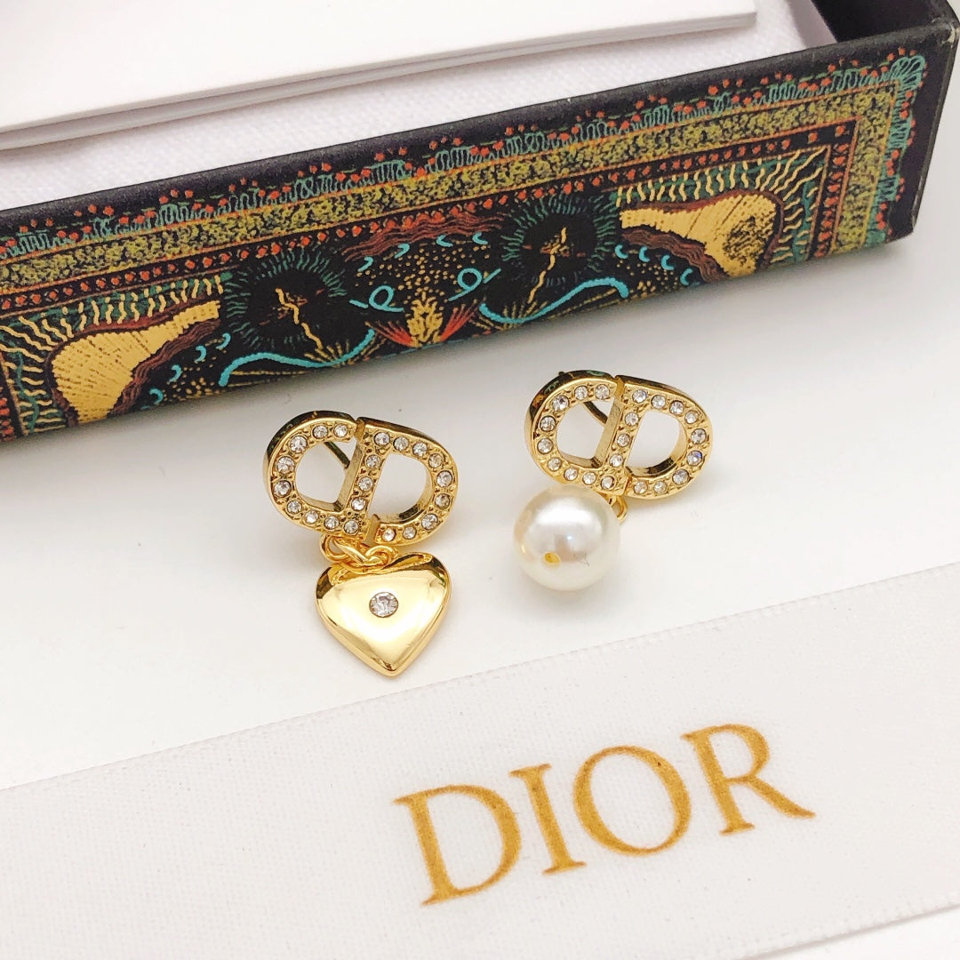 Martin Graham stud earrings in polished metal-tone – main product view