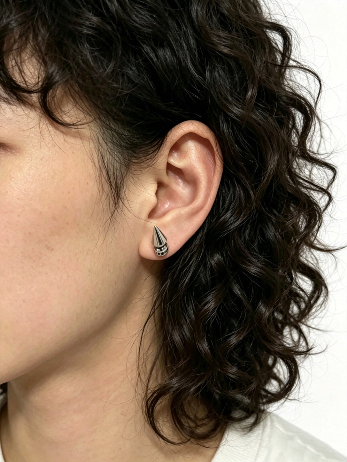 Martin Graham earrings in polished metal-tone – front product view