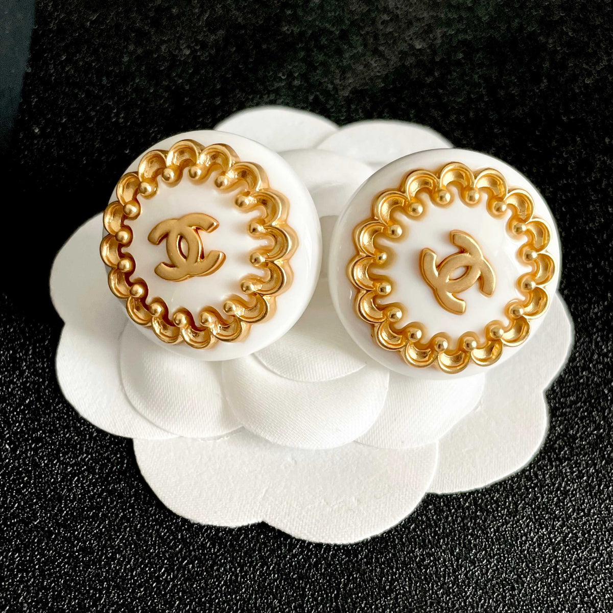 Martin Graham stud earrings in polished metal-tone – front product view