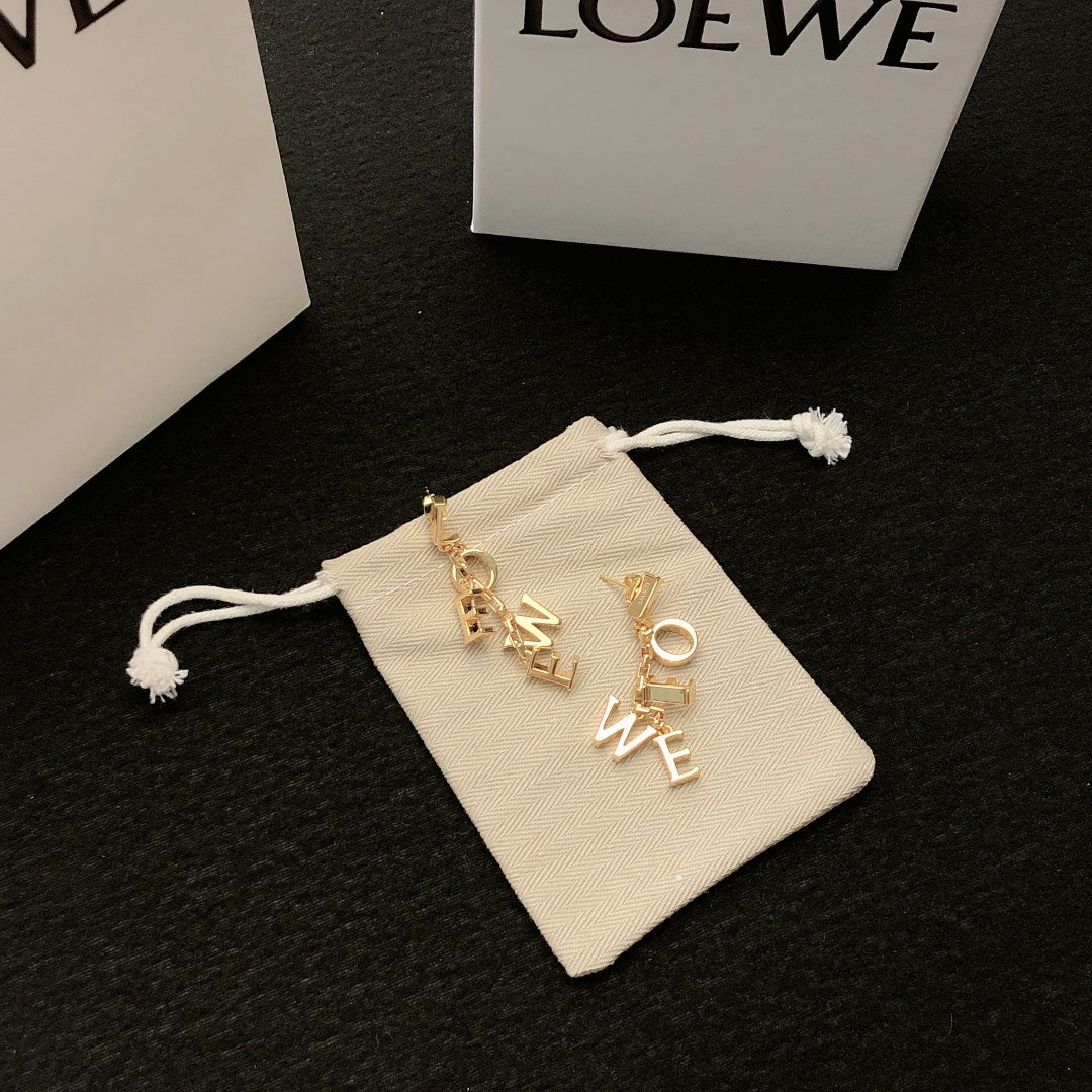 Martin Graham stud earrings in polished metal-tone – front view