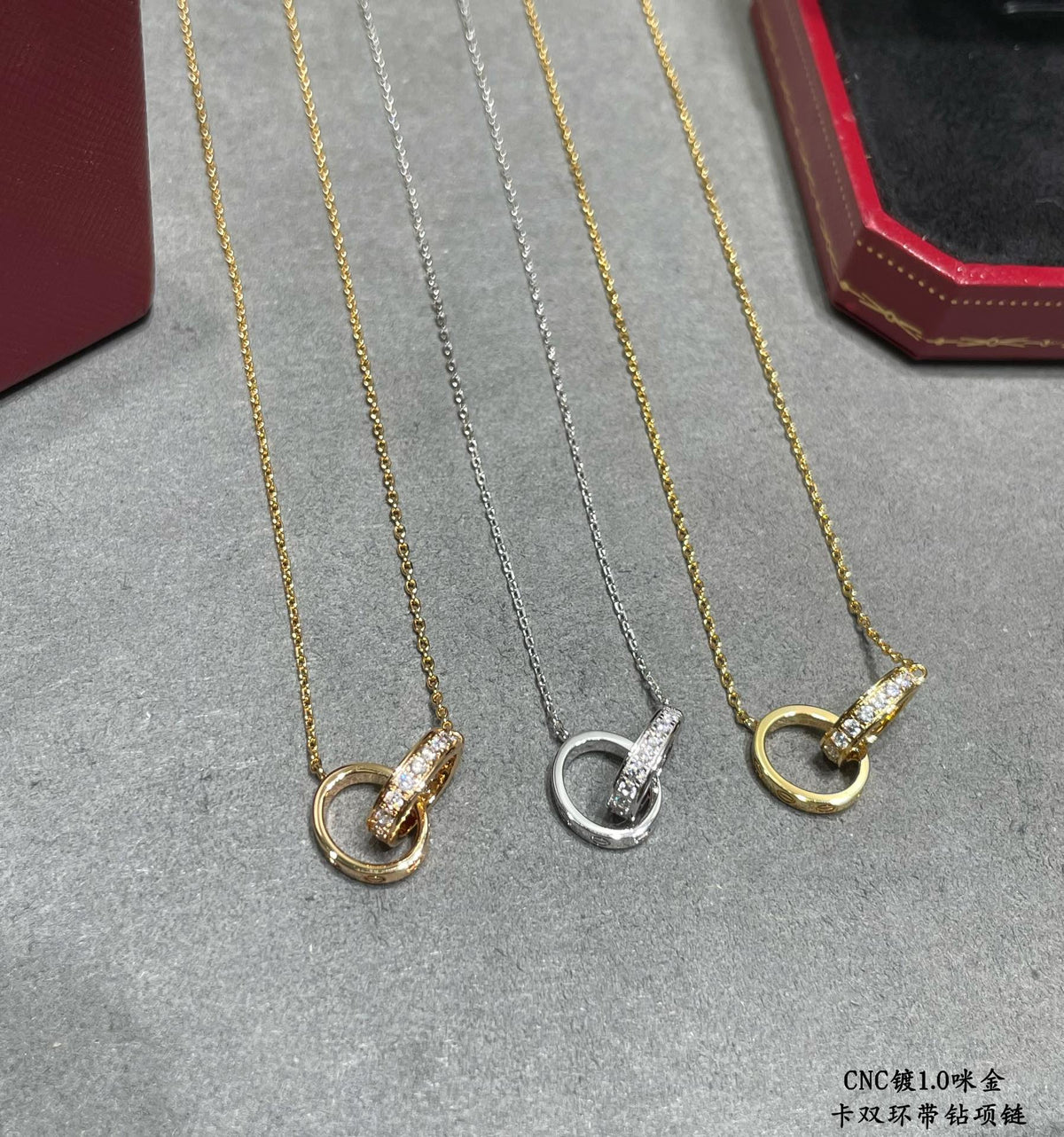 Martin Graham pendant necklace in polished metal-tone – front view