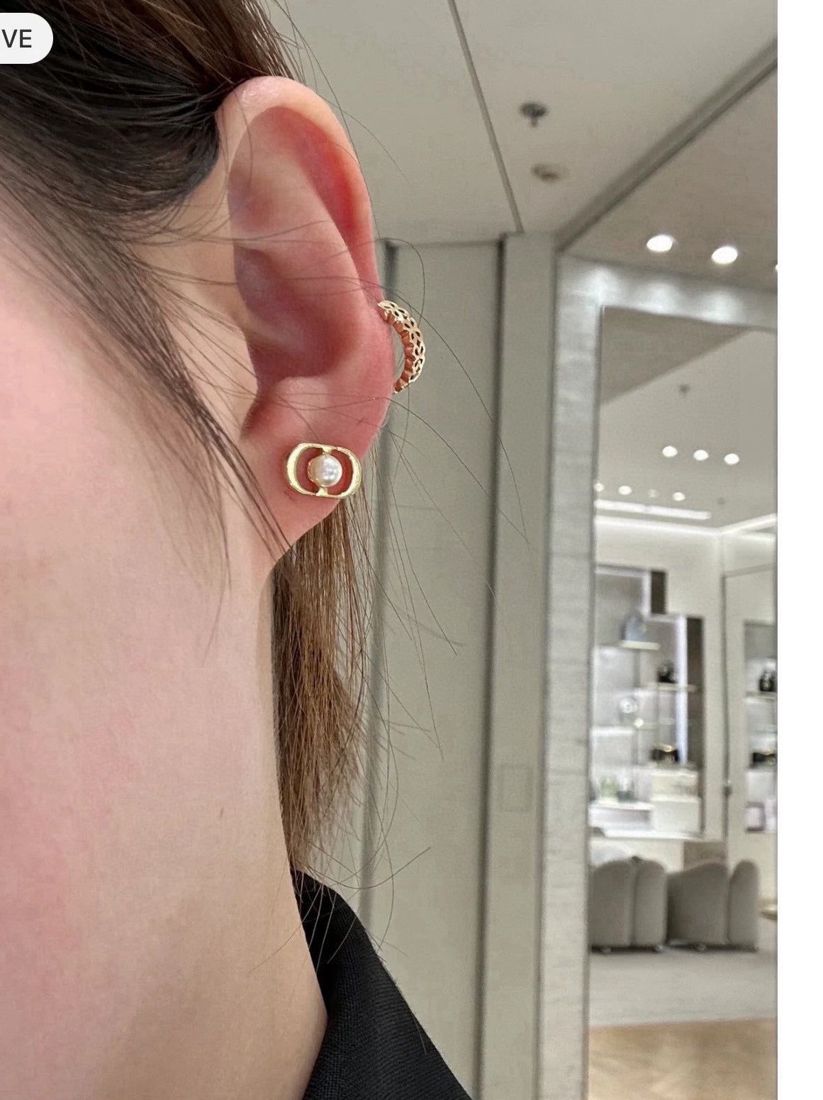 Martin Graham stud earrings in polished metal-tone – front view
