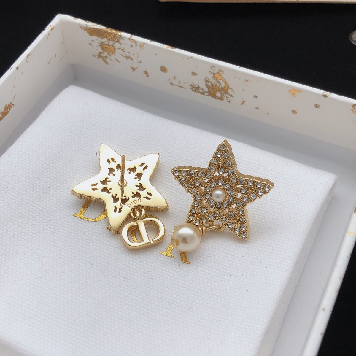 Martin Graham stud earrings in polished metal-tone – front view