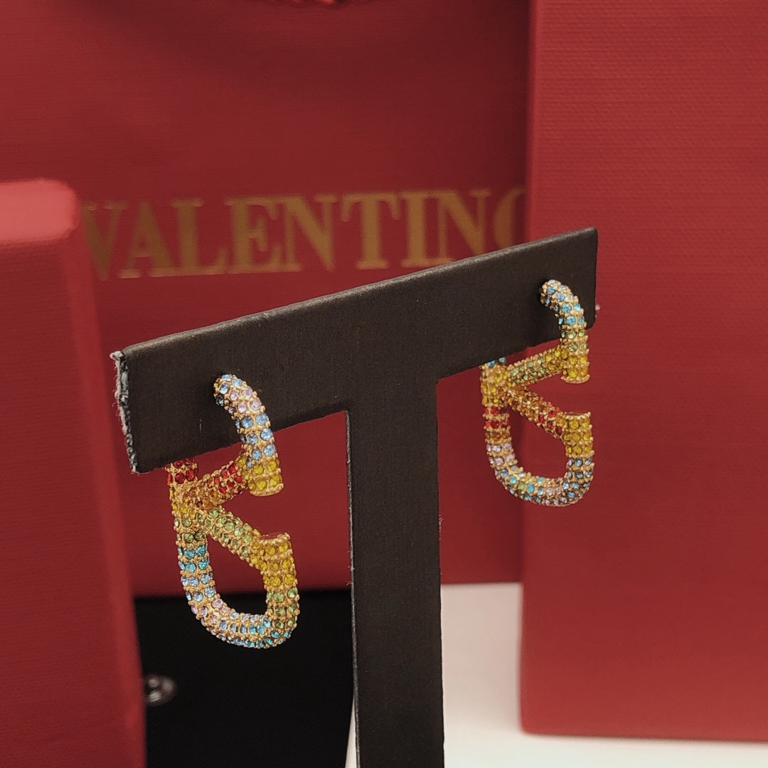 Martin Graham stud earrings in polished metal-tone – front view