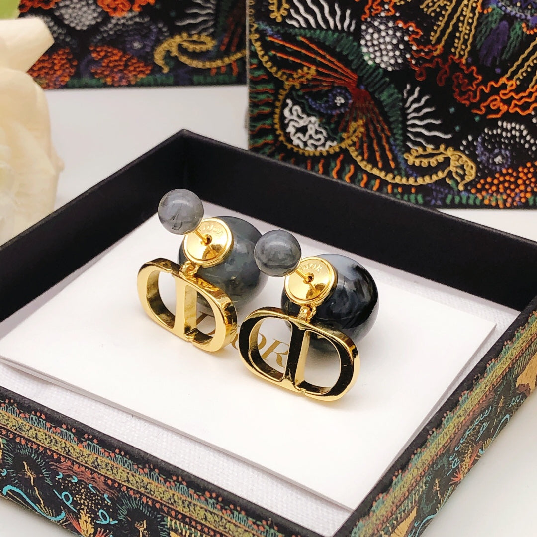 Martin Graham stud earrings in polished metal-tone – front view
