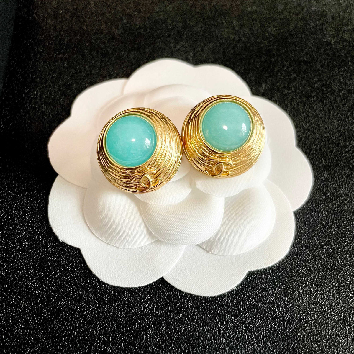 Martin Graham stud earrings in polished metal-tone – front product view