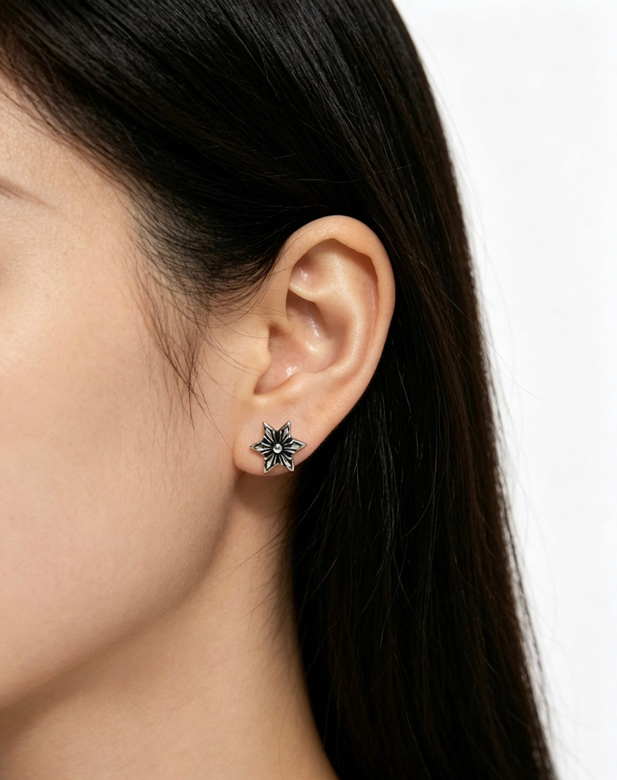 Martin Graham earrings in polished metal-tone – front product view
