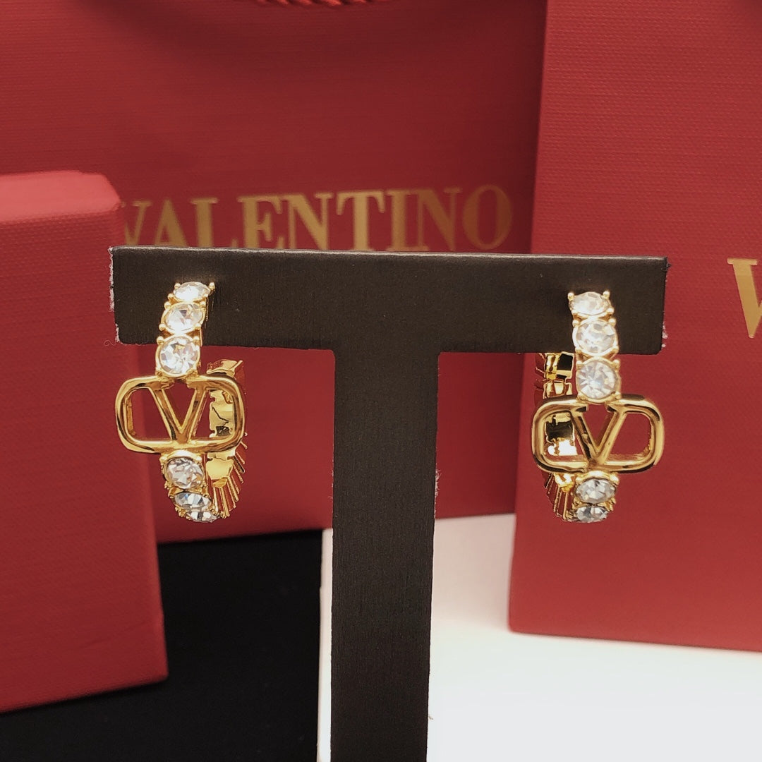 Martin Graham earrings in polished metal-tone – front view