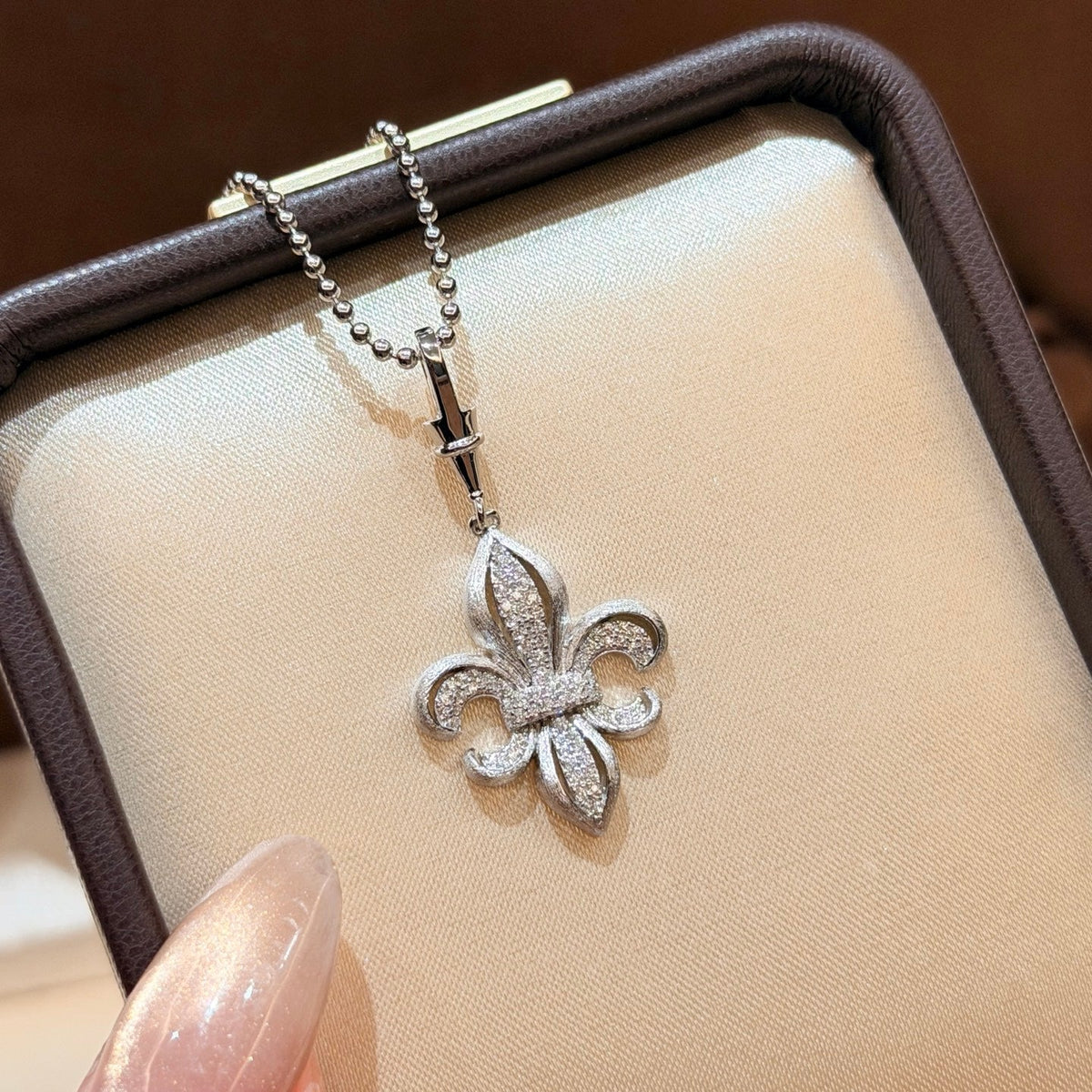 Martin Graham pendant necklace in polished metal-tone – front product view