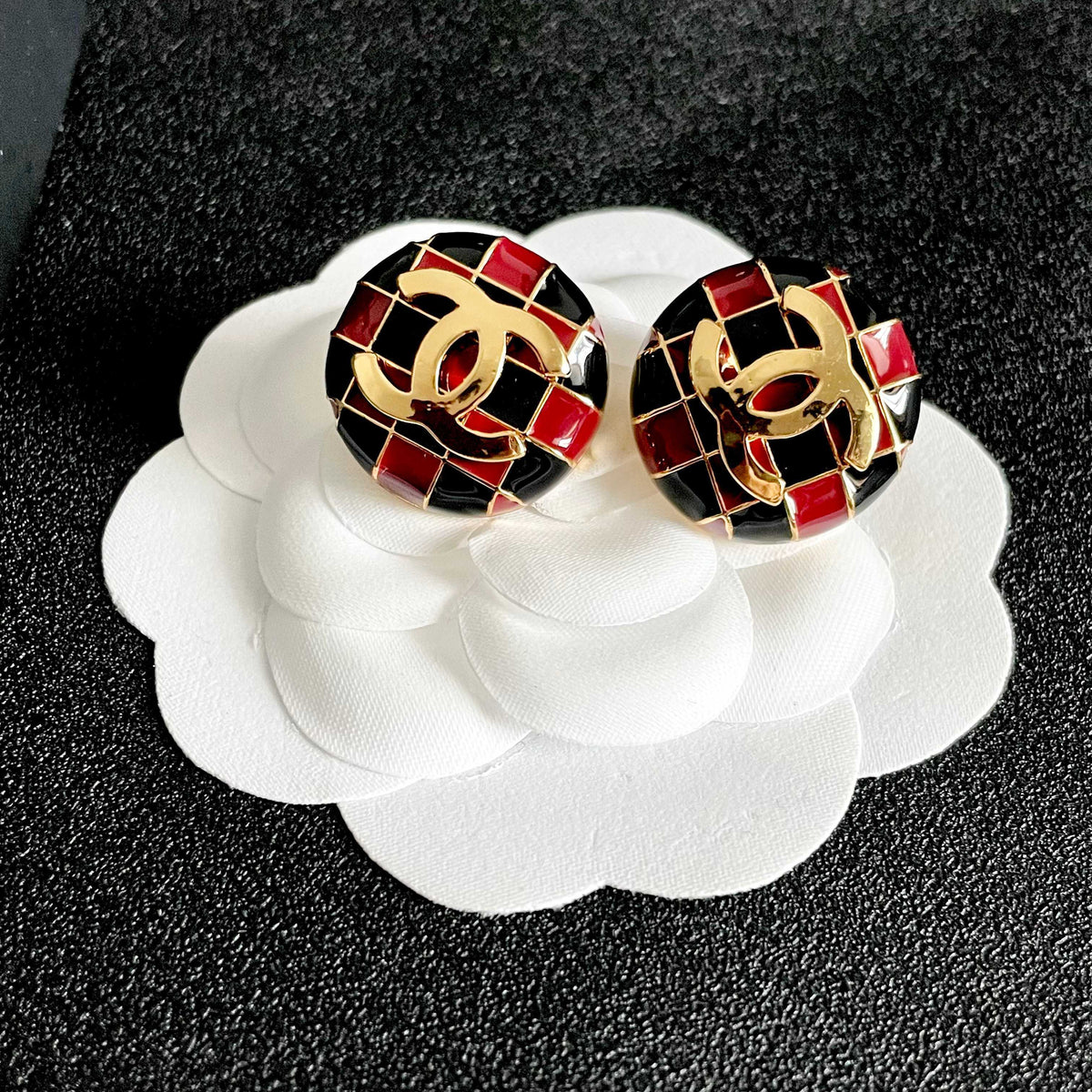 Martin Graham stud earrings in polished metal-tone – front product view