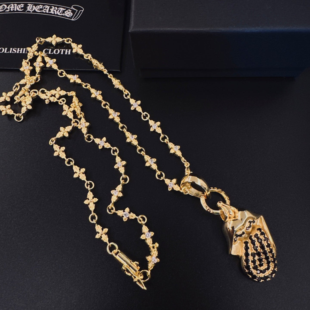 Martin Graham pendant necklace in polished metal-tone – front product view