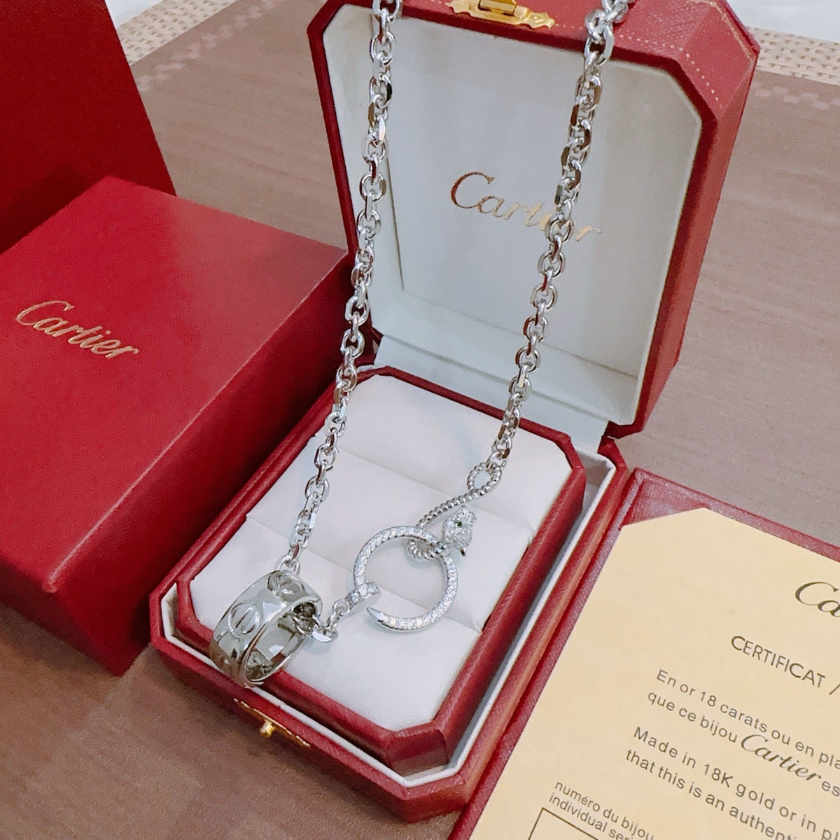 Martin Graham pendant necklace in polished metal-tone – front view