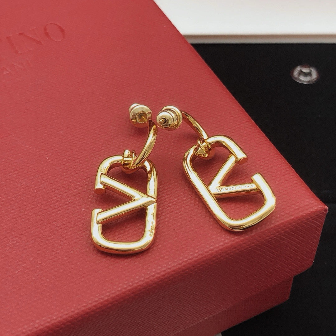 Martin Graham drop earrings in polished metal-tone – front view