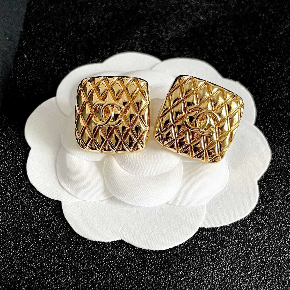 Martin Graham stud earrings in polished metal-tone – front product view