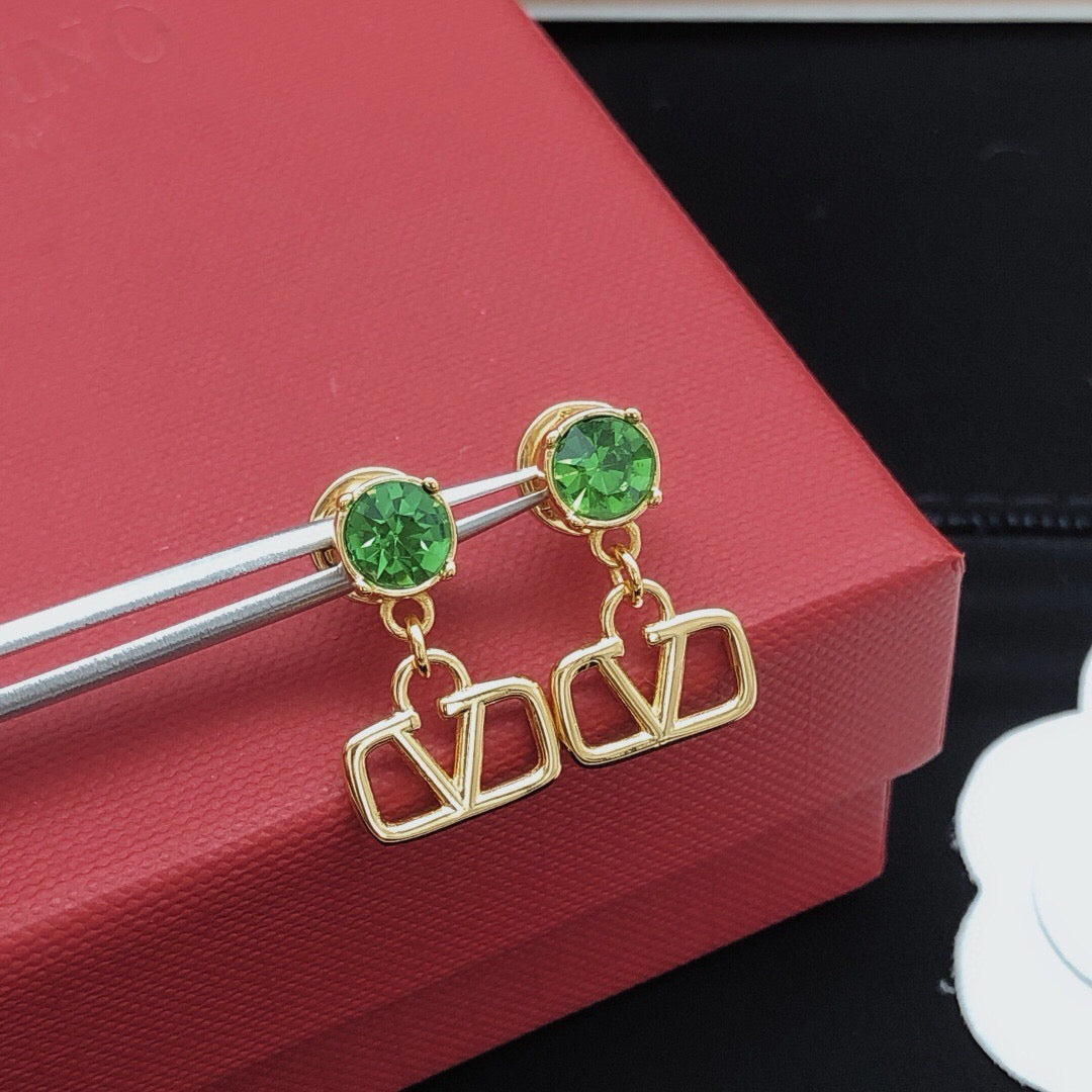 Martin Graham stud earrings in polished metal-tone – front view