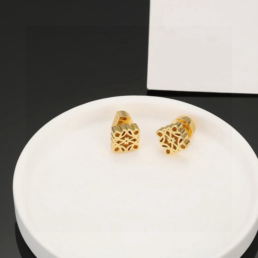Martin Graham stud earrings in polished metal-tone – front view