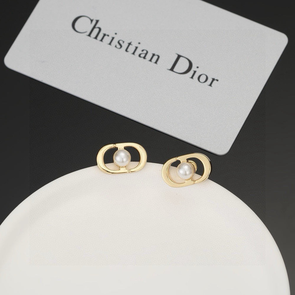 Martin Graham stud earrings in polished metal-tone – front view