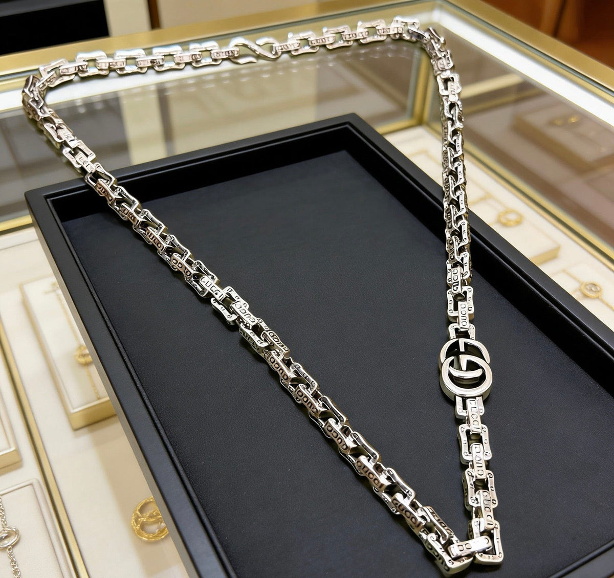 Martin Graham pendant necklace in polished metal-tone – front product view