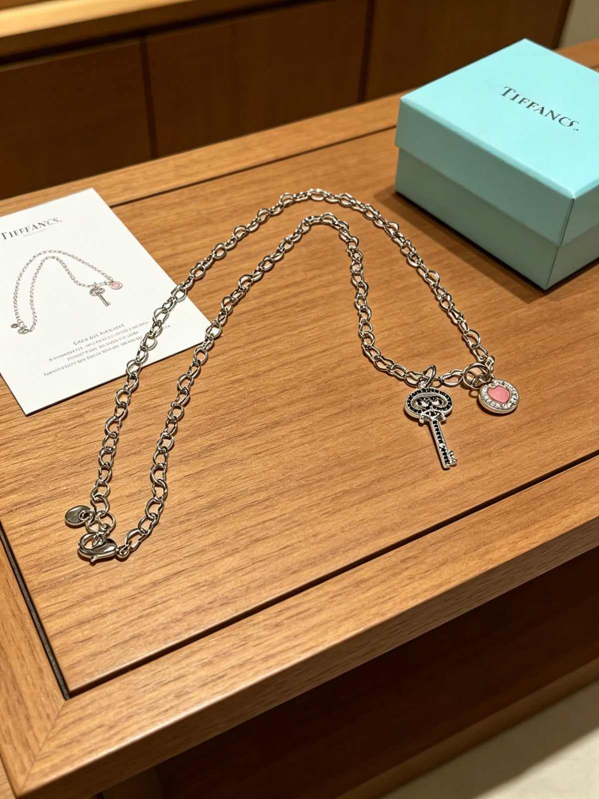 Martin Graham pendant necklace in polished metal-tone – front product view