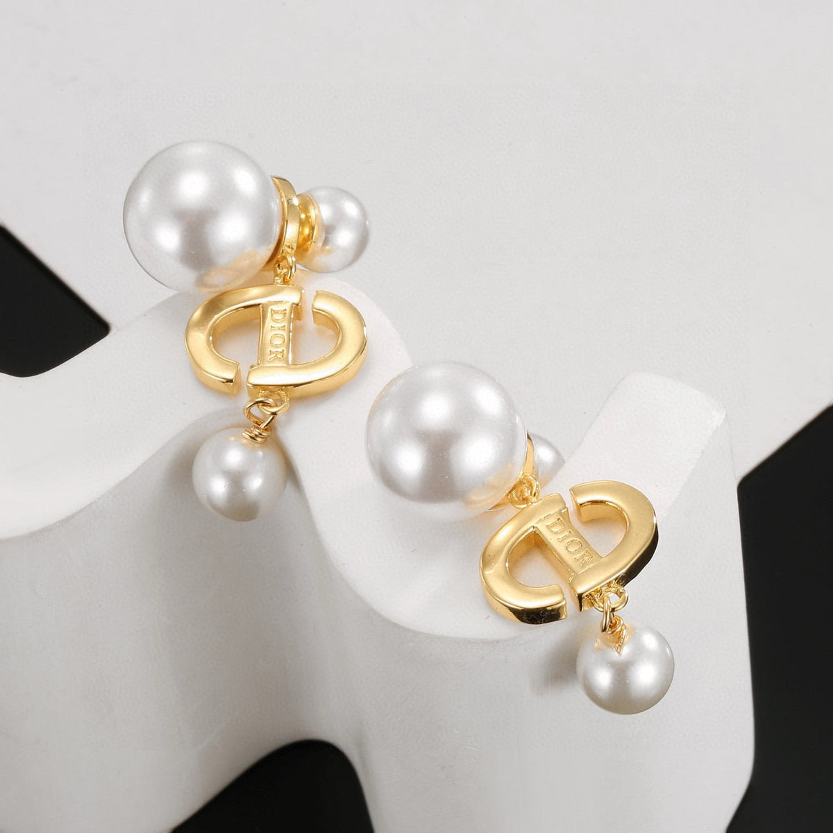 Martin Graham earrings in polished metal-tone – front view