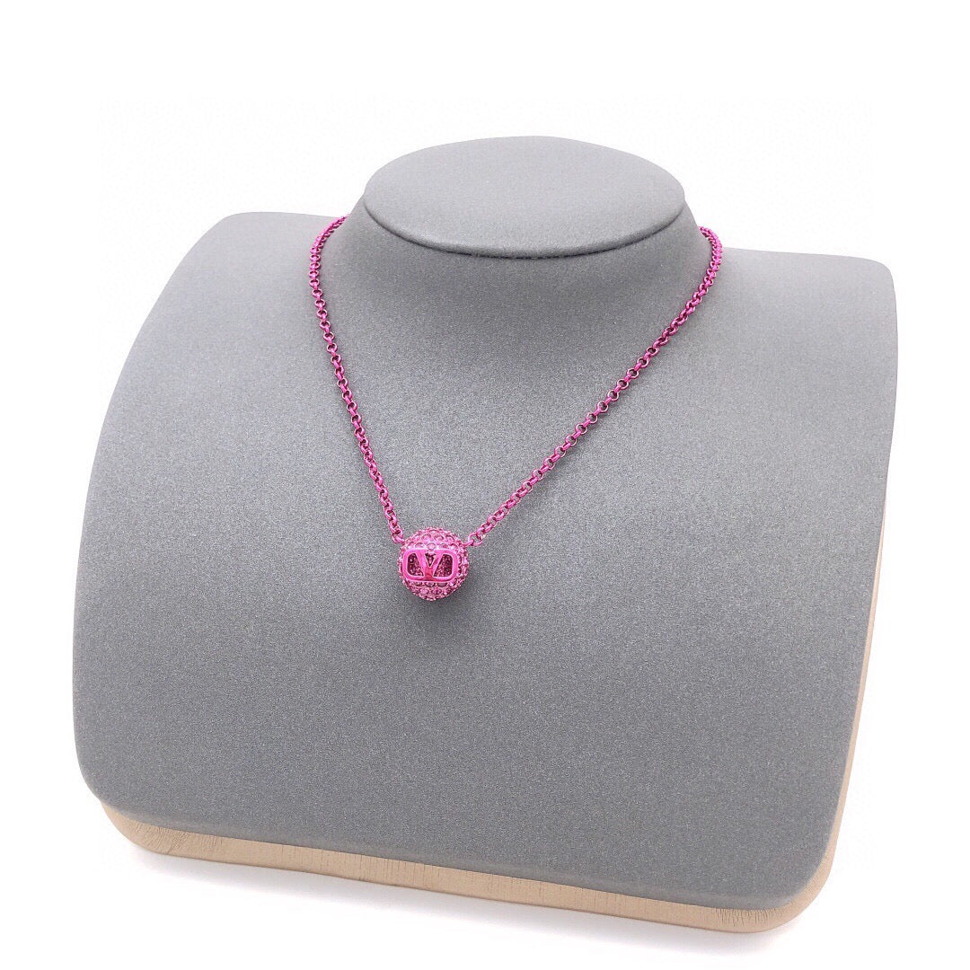 Martin Graham pendant necklace in polished metal-tone – front view