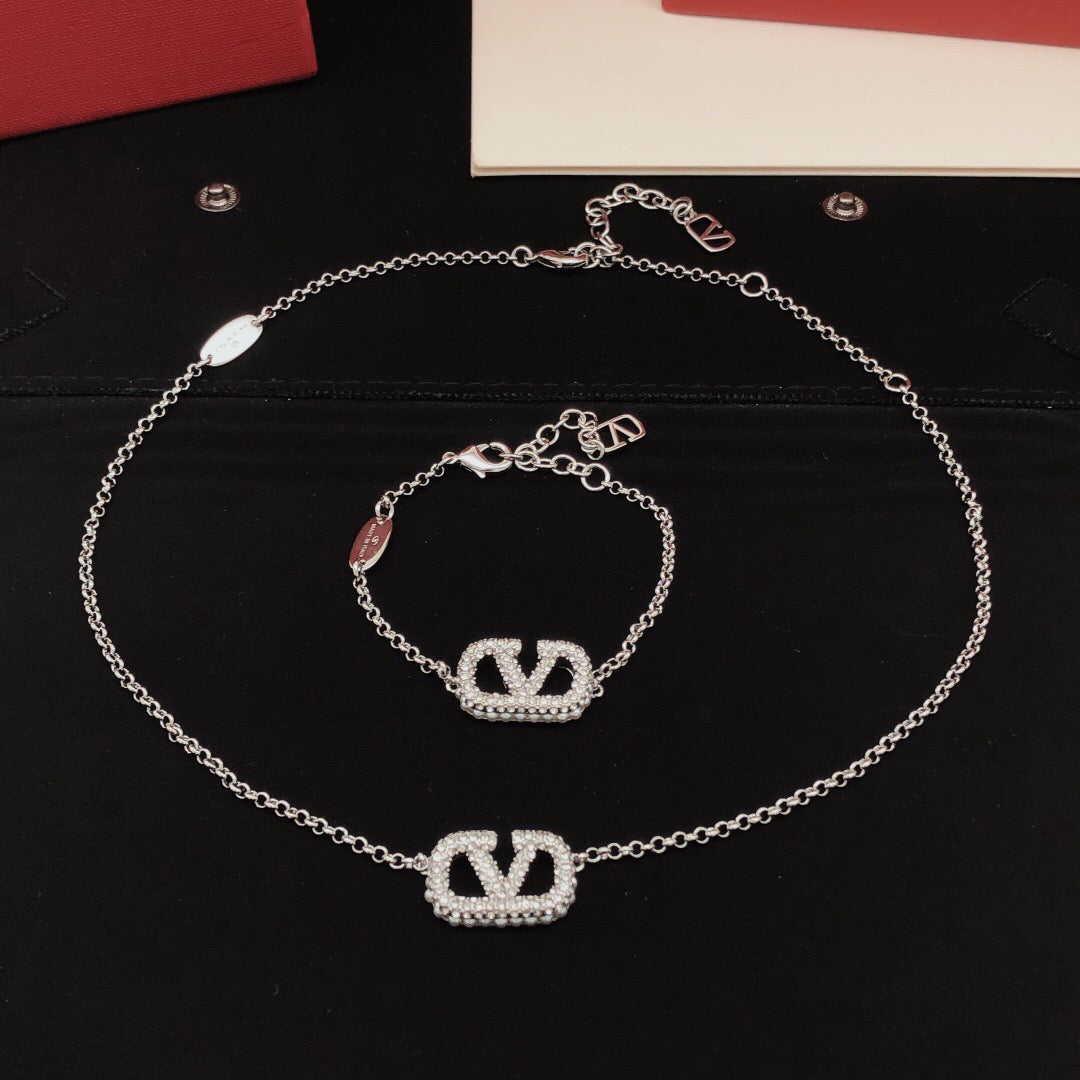 Martin Graham pendant necklace in polished metal-tone – front view