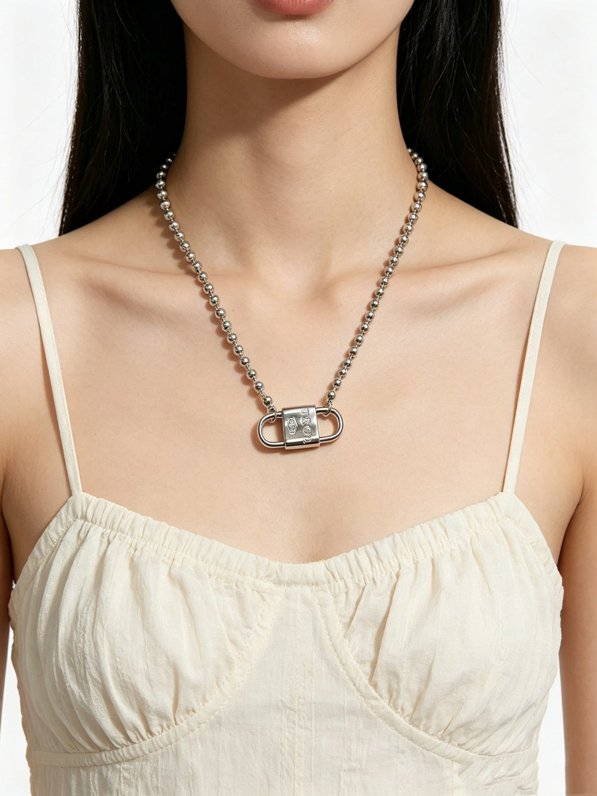Martin Graham pendant necklace in polished metal-tone – front product view