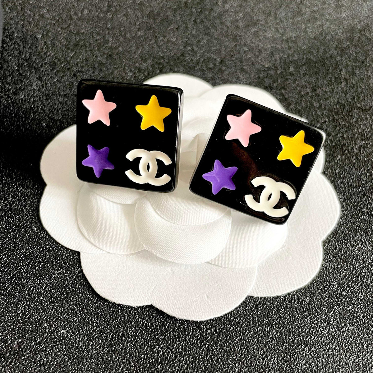 Martin Graham stud earrings in polished metal-tone – front product view