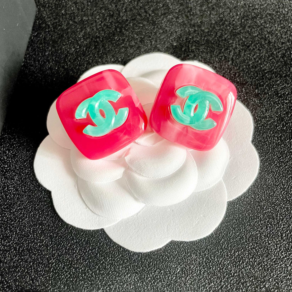 Martin Graham stud earrings in polished metal-tone – front product view