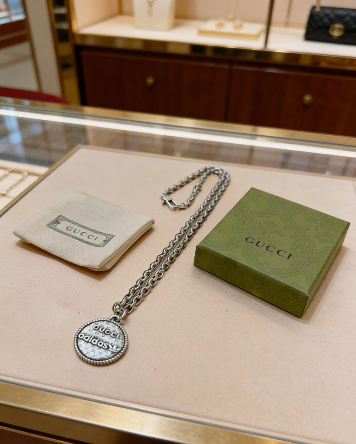 Martin Graham pendant necklace in polished metal-tone – front product view