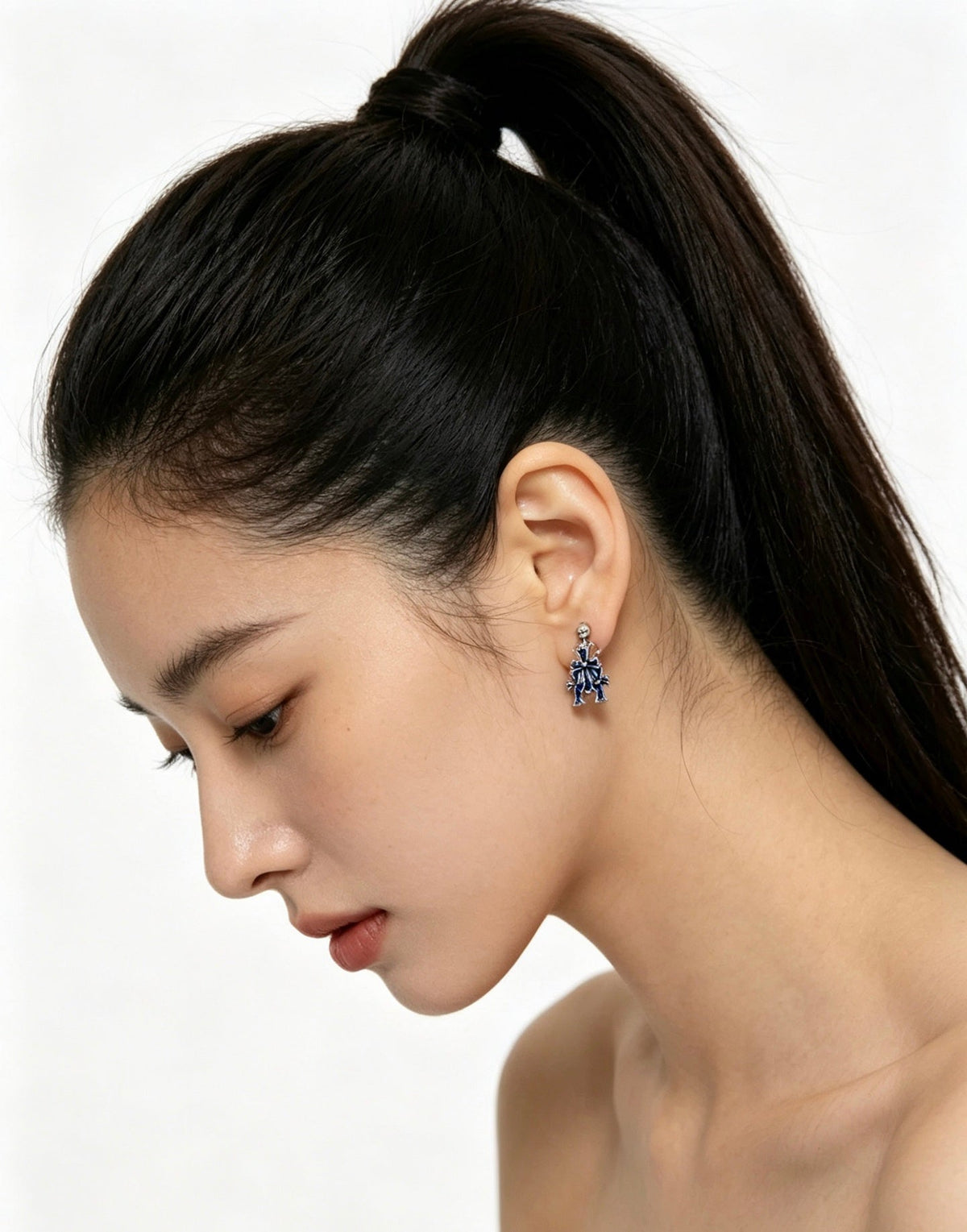 Martin Graham earrings in polished metal-tone – front product view