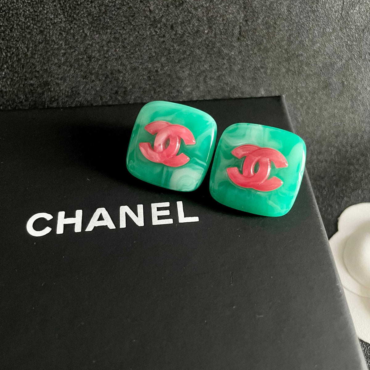 Martin Graham stud earrings in polished metal-tone – detail view