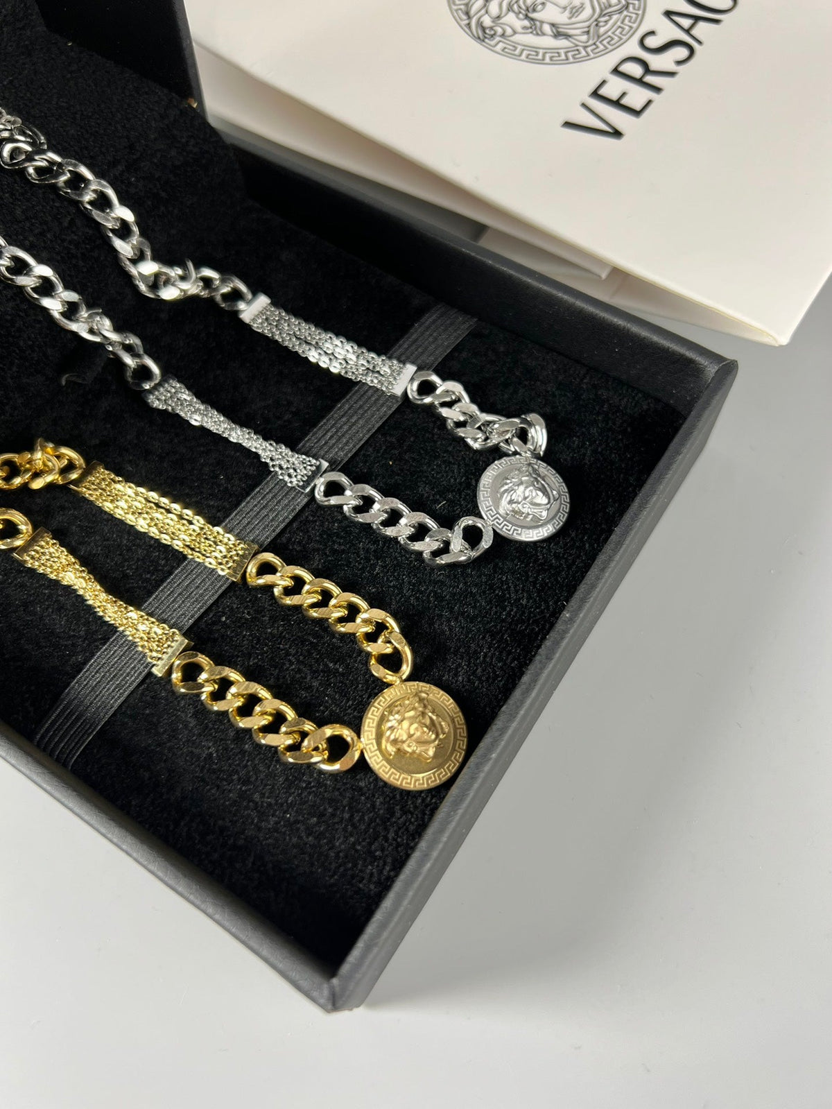 Martin Graham pendant necklace in polished metal-tone – detail view
