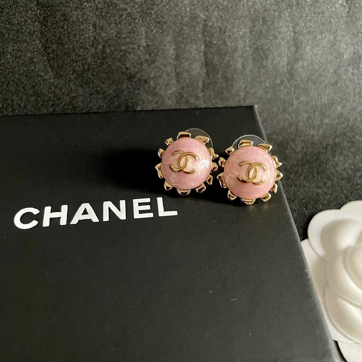 Martin Graham stud earrings in polished metal-tone – detail view
