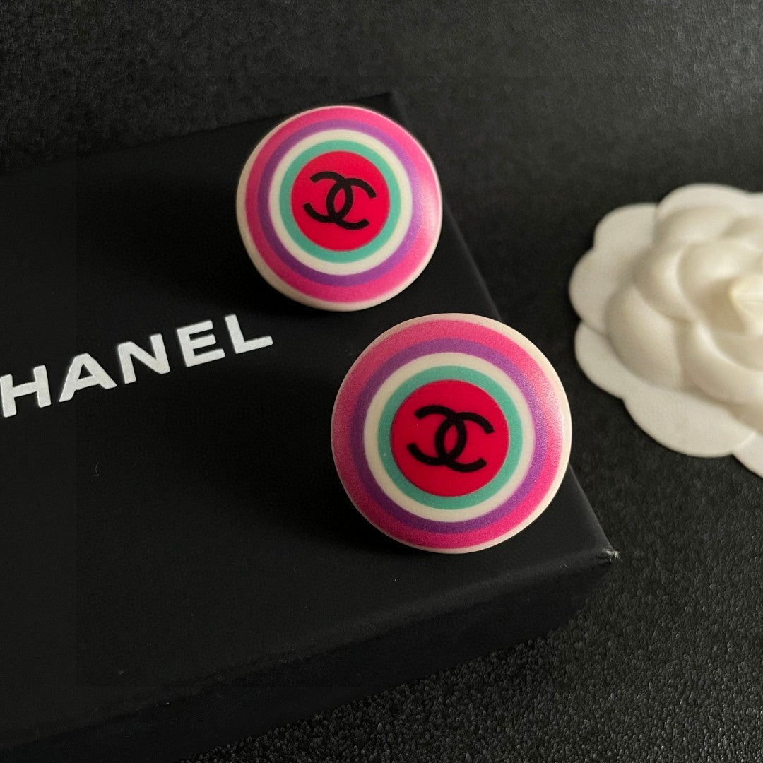 Martin Graham stud earrings in polished metal-tone – detail view