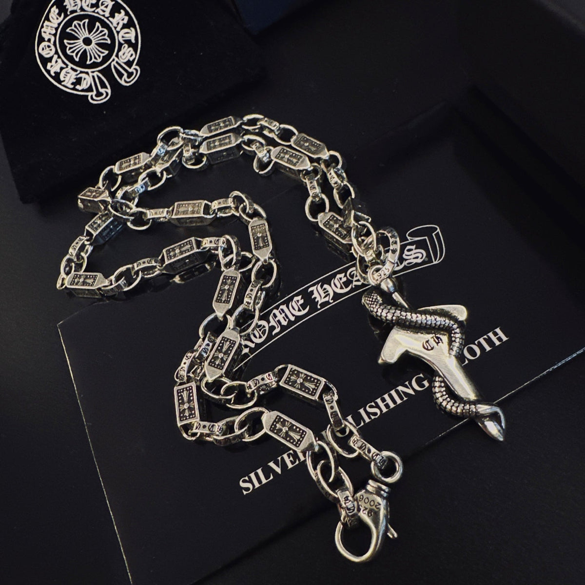 Martin Graham pendant necklace in polished metal-tone – detail view