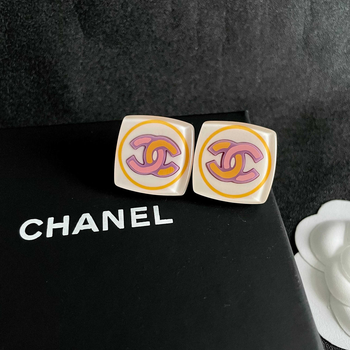 Martin Graham stud earrings in polished metal-tone – detail view